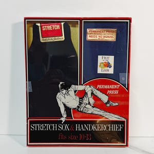 May include: A boxed set containing dark socks and a blue handkerchief. The packaging features red and black accents with text including STRETCH, PERMANENT PRESS, FRUIT OF THE LOOM, and STRETCH SOX & HANDKERCHIEF, with a graphic of a person and size 10-13.