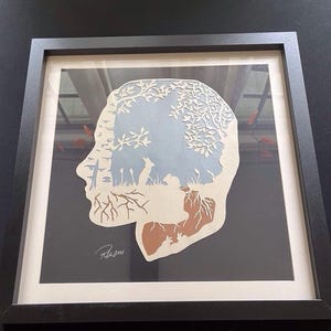 Art du papier découpé à la main silhouette