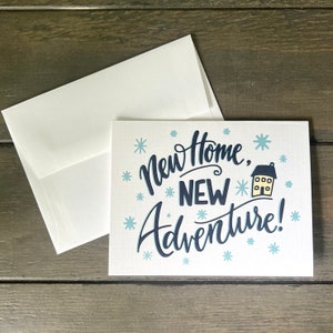 Nieuw huis, nieuw avontuur wenskaart