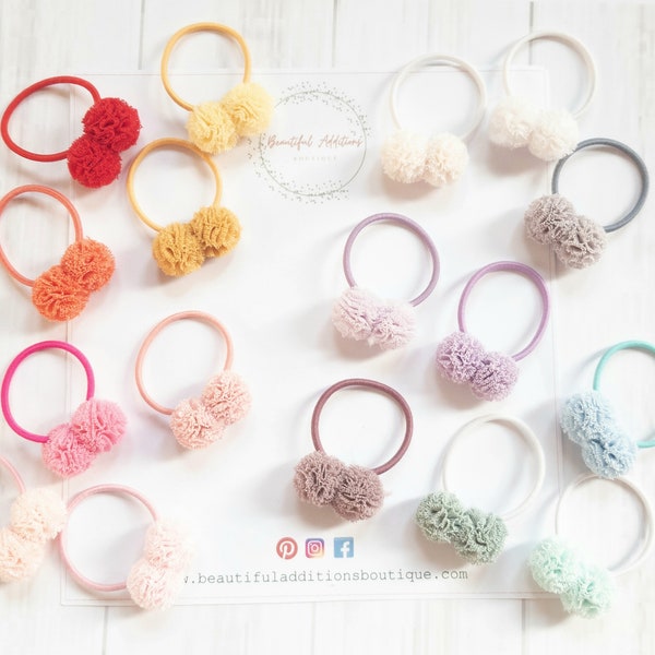 Pompons pour tout-petits. Elastiques à cheveux. Elastiques à cheveux pour bébé.