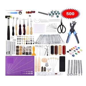 May include: A set of 500 leather craft tools, including punches, awls, needles, thread, rivets, and a cutting mat. The tools are arranged on a white background.