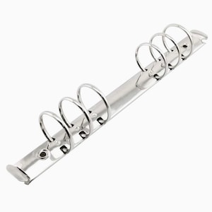 May include: Silver binder mechanism with five rings. The rings are designed to hold papers and documents together.