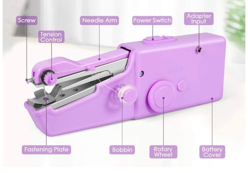 May include: A purple handheld sewing machine with a white bobbin, a rotary wheel, a tension control knob, and a battery cover. The machine has a needle arm, a power switch, and an adapter input.