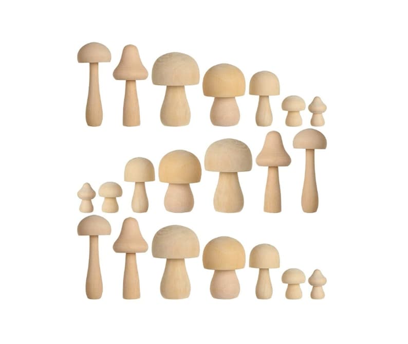 May include: A collection of 18 unfinished wooden mushroom shapes in various sizes. The mushrooms are made of natural wood and are ready to be painted or decorated.