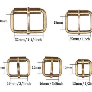 May include: Five different sizes of antique gold metal buckle closures. The buckles are 1 1/4 inches, 1 inch, 3/4 inch, 5/8 inch, and 1/2 inch wide.