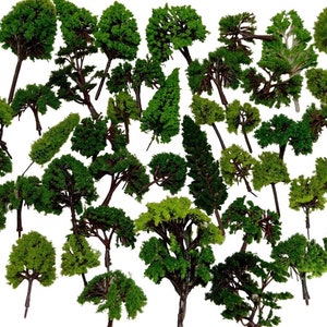 May include: A collection of miniature green trees, perfect for model railroading or other miniature scenes. The trees are made of a soft, green material and have realistic-looking branches.