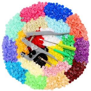 May include: A set of colorful plastic snap buttons in various colors, including red, blue, green, yellow, and white. The set also includes a tool for attaching the buttons to fabric.