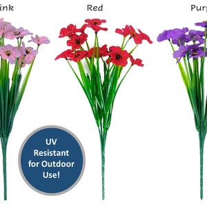 May include: Three bunches of artificial flowers, each with a different color: pink, red, and purple. The flowers are all the same type, with a delicate, open bloom. The flowers are UV resistant and suitable for outdoor use.