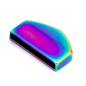 May include: A half-round, iridescent metal charm with a black line across the centre. The charm has a rainbow finish with shades of blue, green, purple, and pink.