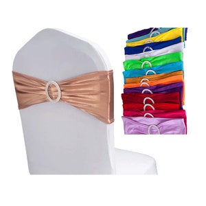 May include: A set of 10 chair sashes in various colors, including teal, yellow, white, green, turquoise, orange, purple, red, pink, and lavender. Each sash has a decorative rhinestone buckle.