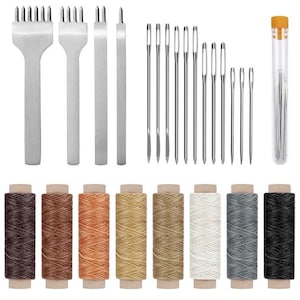 May include: Leather craft tools set with three different sized stitching punches, 12 needles, and eight spools of waxed thread in various colors.