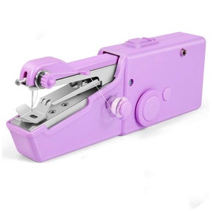 May include: A small, handheld, purple electric sewing machine with a white bobbin and a silver needle. The machine has a built-in thread cutter and a speed control dial.