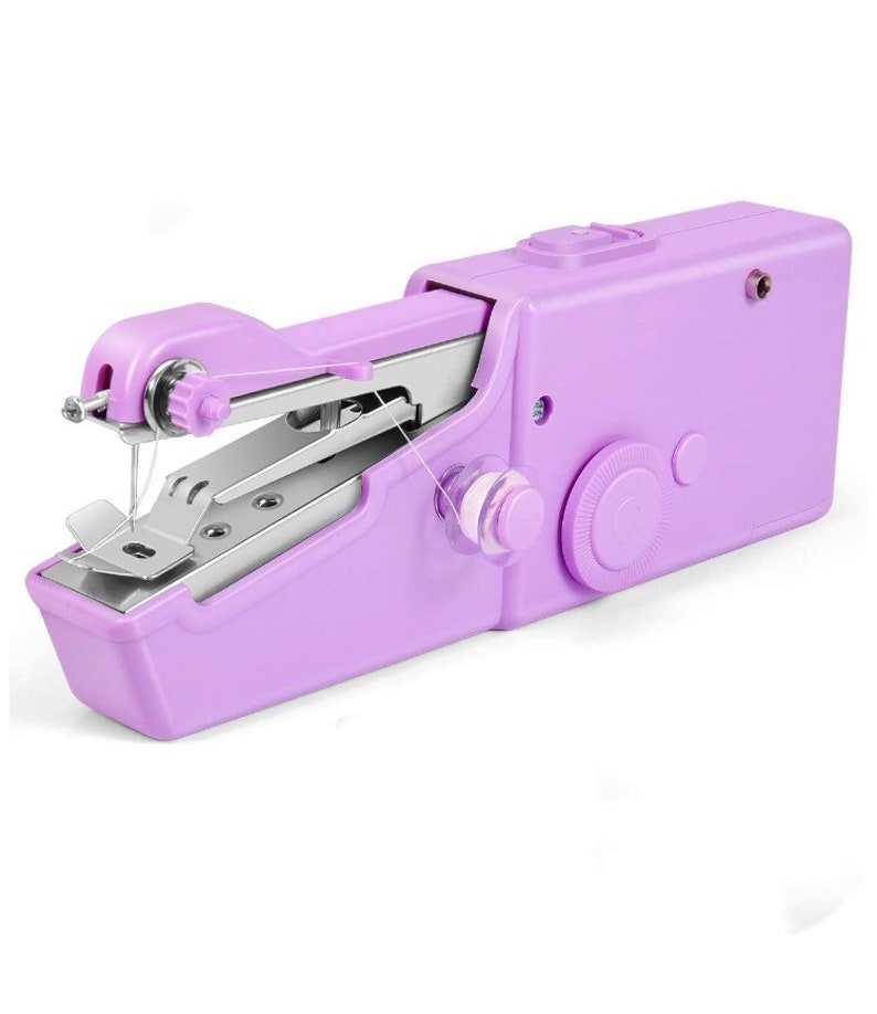 May include: A small, handheld, purple electric sewing machine with a white bobbin and a silver needle. The machine has a built-in thread cutter and a speed control dial.
