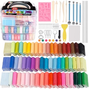 May include: A set of 60 colours of polymer clay in a clear plastic storage container. The clay is arranged in rows of 5 colours each. The set also includes tools for working with clay, such as a rolling pin, a sculpting tool, and a clay cutter. The set also includes a silicone mould for making shapes.