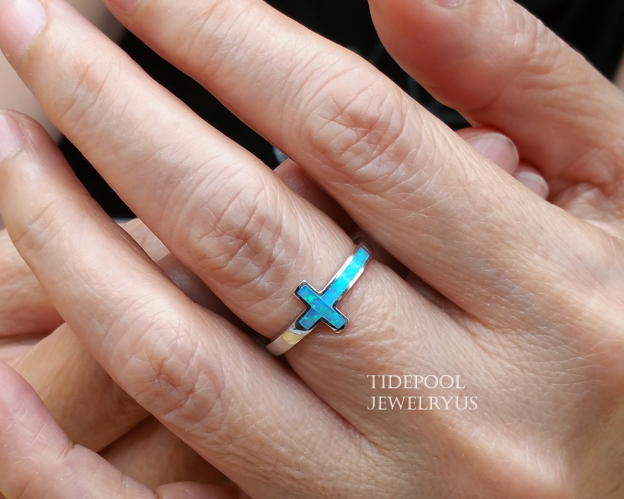 Opal cross ring deals