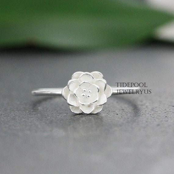 White clearance lotus ring