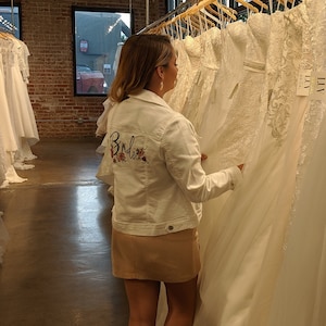 Hand painted Demin Jacket.  Custom name, bride, bridesmaids and more with your choice of flower colors