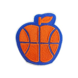 May include: Embroidered patch with a basketball design inside an apple shape. The patch has a blue border and background, with an orange basketball design. The stem and leaf are also orange. The patch is designed to be ironed on.