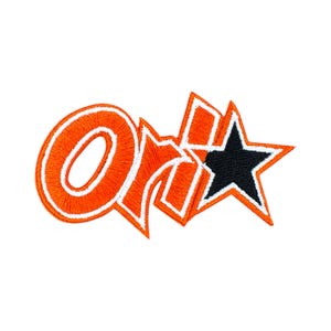 May include: Embroidered patch featuring the word "On" in orange with white trim, and a black star with orange trim. The patch has a 3D effect and is likely for clothing or accessories.
