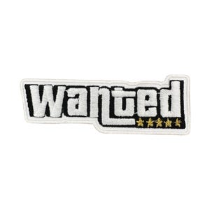 May include: Embroidered patch with the word "Wanted" in a bold, stylized font, outlined in black and white. Features five gold stars at the bottom, resembling a wanted level. Perfect for jackets, bags, or other accessories.