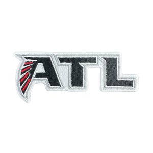 May include: Embroidered patch featuring the letters "ATL" in a stylized design. The letters are black with a silver outline and a white background. The "A" has a red and black bird wing design.