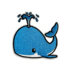 Puede incluir: Una ballena azul con un contorno blanco y un chorro de agua en la parte superior. La ballena tiene una cara linda y de estilo de dibujos animados.