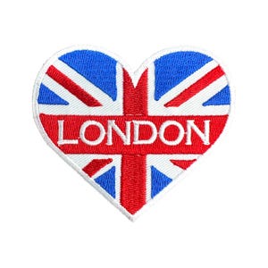 May include: A heart-shaped patch featuring the Union Jack flag design in red, white, and blue. The word "LONDON" is embroidered in white across the center of the patch. The patch has a white border.