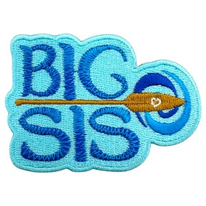 May include: Blue and gold embroidered patch with the words "Big Sis" and a stylized paddle in a wave design.