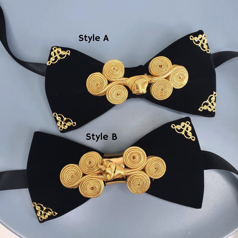 May include: Two black velvet bow ties with gold decorative accents. The top bow tie is labelled "Style A" and the bottom bow tie is labelled "Style B".