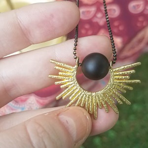 Solar Eclipse Flip Frame Necklace Playthings Studio Matte Onyx