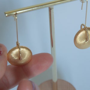 Cointoss Spinning Coin Earrings Playthings Studio image 1