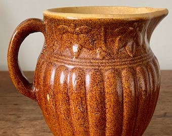 Vintage Yellow Ware Pitcher Brown: Ribbed Design with Leaves Stoneware