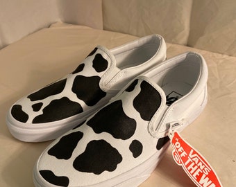 vans cow print slip on