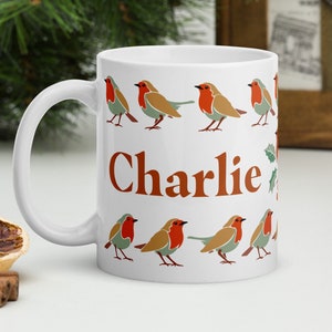 Custom personizable cottagecore robin Christmas person name mug gift.