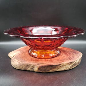 May include: A set of three ceramic mugs with a speckled, matte finish. The mugs are in shades of cream, light gray, and dark gray. Each mug has a simple, minimalist design, perfect for coffee or tea.