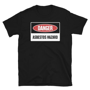 May include: Black t-shirt with a white warning sign that reads "DANGER ASBESTOS HAZARD".