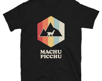 May include: Black t-shirt with a retro-style graphic of a llama in front of a mountain range. The graphic has a red, orange, yellow, and blue color scheme. The text "MACHU PICCHU" is printed below the graphic.
