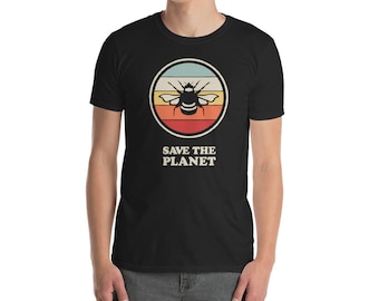 May include: Black t-shirt with a retro-style graphic of a bee in a circle with the text "Save the Planet".