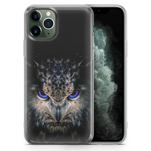 May include: Clear phone case with a graphic of an owl with blue eyes. The owl's feathers are brown and gray.