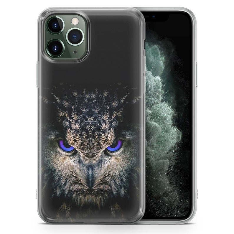 May include: Clear phone case with a graphic of an owl with blue eyes. The owl's feathers are brown and gray.