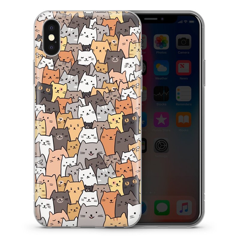 May include: A clear phone case with a pattern of colorful cartoon cats. The case is designed for an iPhone X.