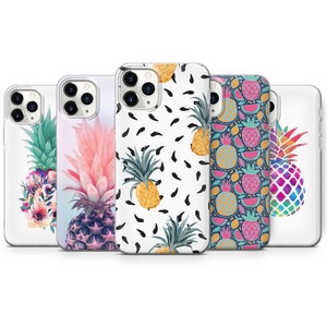 May include: Five different phone cases with pineapple designs. The cases are clear and show the phone's camera lens. The pineapple designs include a watercolor pineapple, a pineapple with flowers, a pineapple with a pink ombre background, a pineapple pattern on a white background, and a rainbow pineapple.