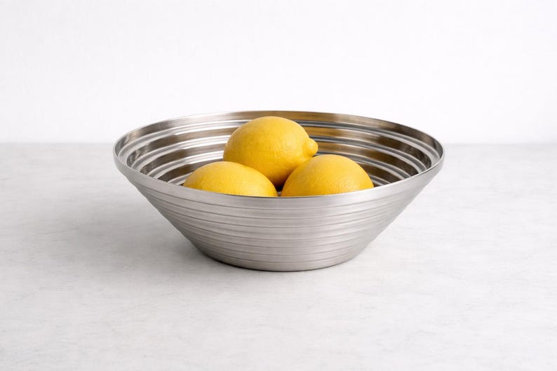 Alessi Maya Stainless Steel Fruit Bowl – Sculptural Italian Postmodern Design by Giulio Confalonieri (1984)