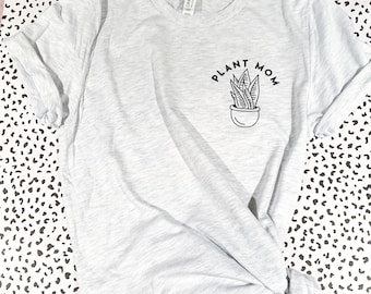 Camiseta estampada com bolso unissex Plant Mom