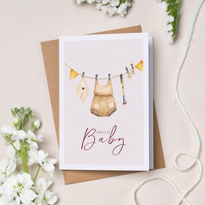 Bonjour carte bébé | Corde à linge | Fanion | Chaîne de sucette | Barboteuse | Carte pliante | Illustration aquarelle | Enveloppe en papier kraft | DIN A6