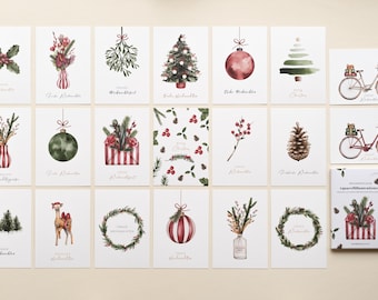 May include: A collection of Christmas greeting cards with watercolor illustrations. Designs include festive greenery, ornaments, a Christmas tree, a bicycle with a tree, and a camel. Each card has a white background and a festive theme.