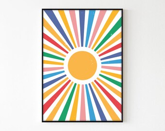 May include: A colorful sunburst design with a yellow sun in the center. The sunburst is made up of red, orange, yellow, green, blue, and purple stripes.