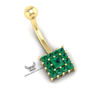 May include: Gold belly button ring with a square-shaped emerald green gemstone cluster.