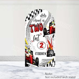 May include: A white and red race car themed birthday party backdrop with the text "Asael is TWO fast 2 curious".