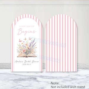 May include: Two arched backdrop covers featuring vertical pink and white stripes. The left cover displays an open book with a floral bouquet, butterflies, and the text A NEW CHAPTER Begins, Amelia's Bridal Shower, and the date 2026.08.13.